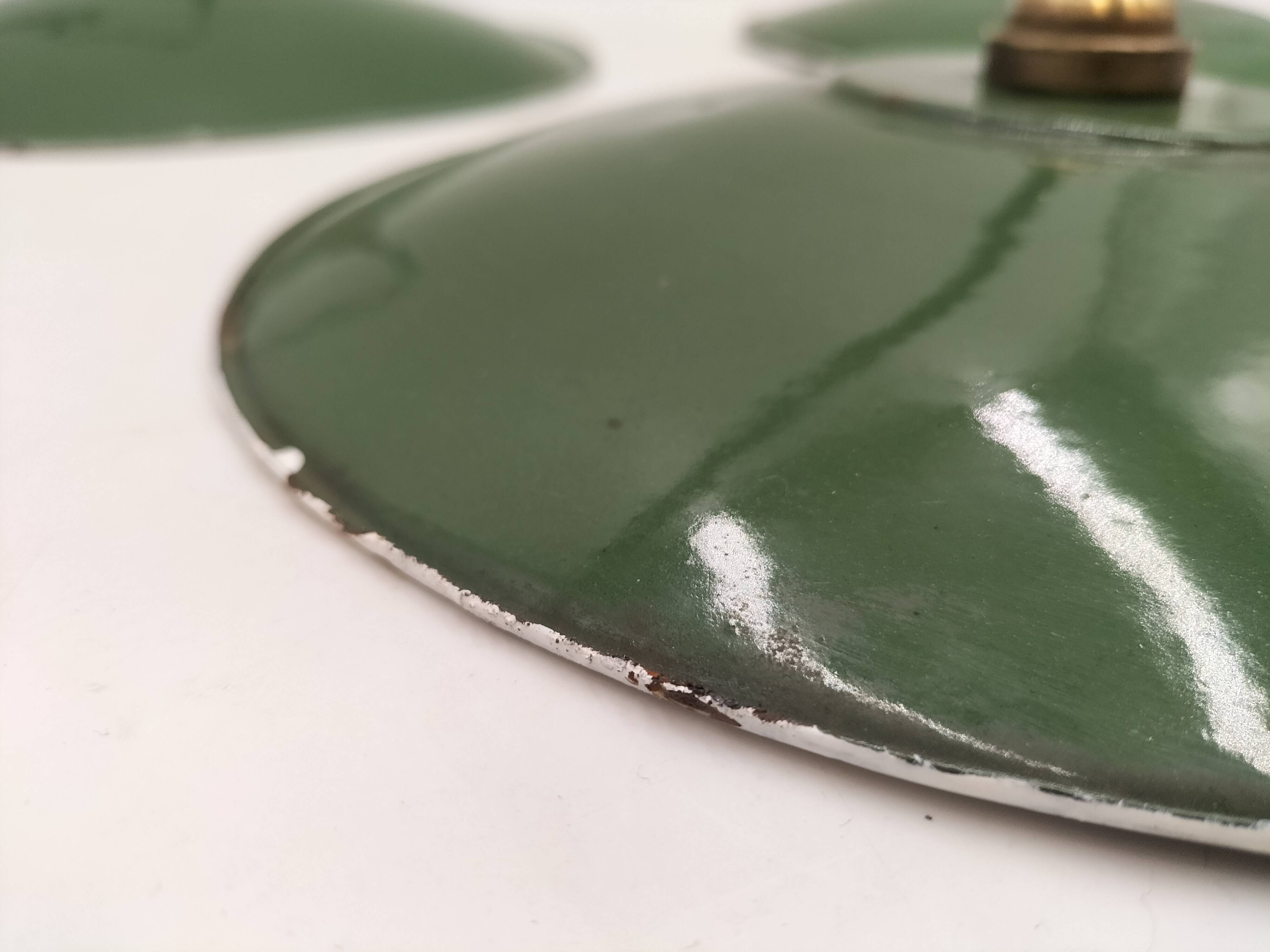 Three enamelled sheet metal suspensions