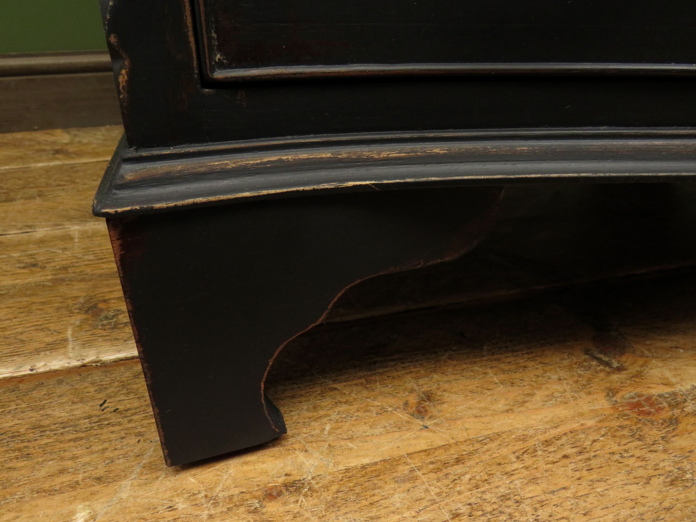 Antique black painted serpentine bachelors chest of drawers