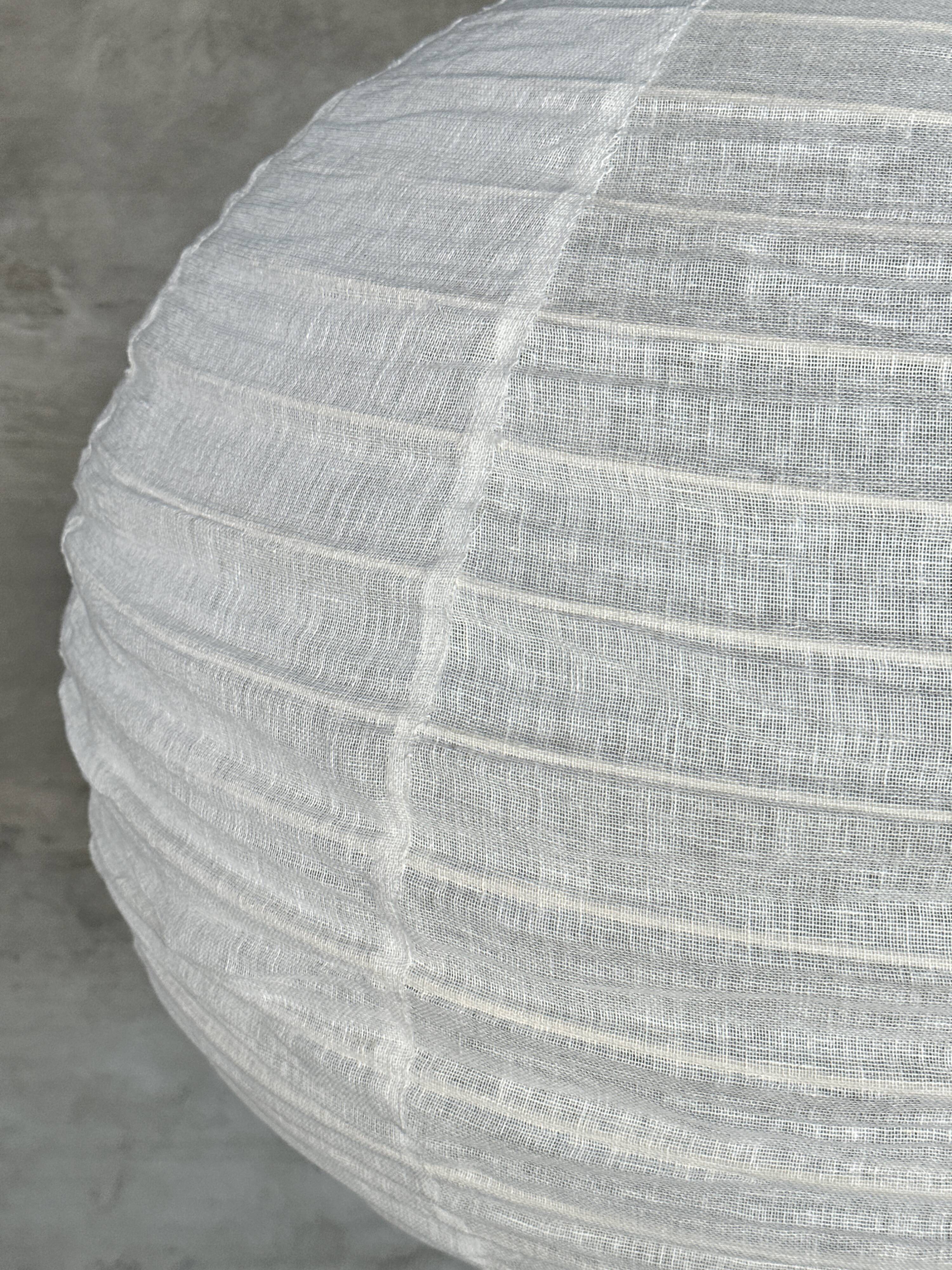 Very large round Japanese-style rattan and natural linen pendant light D:80