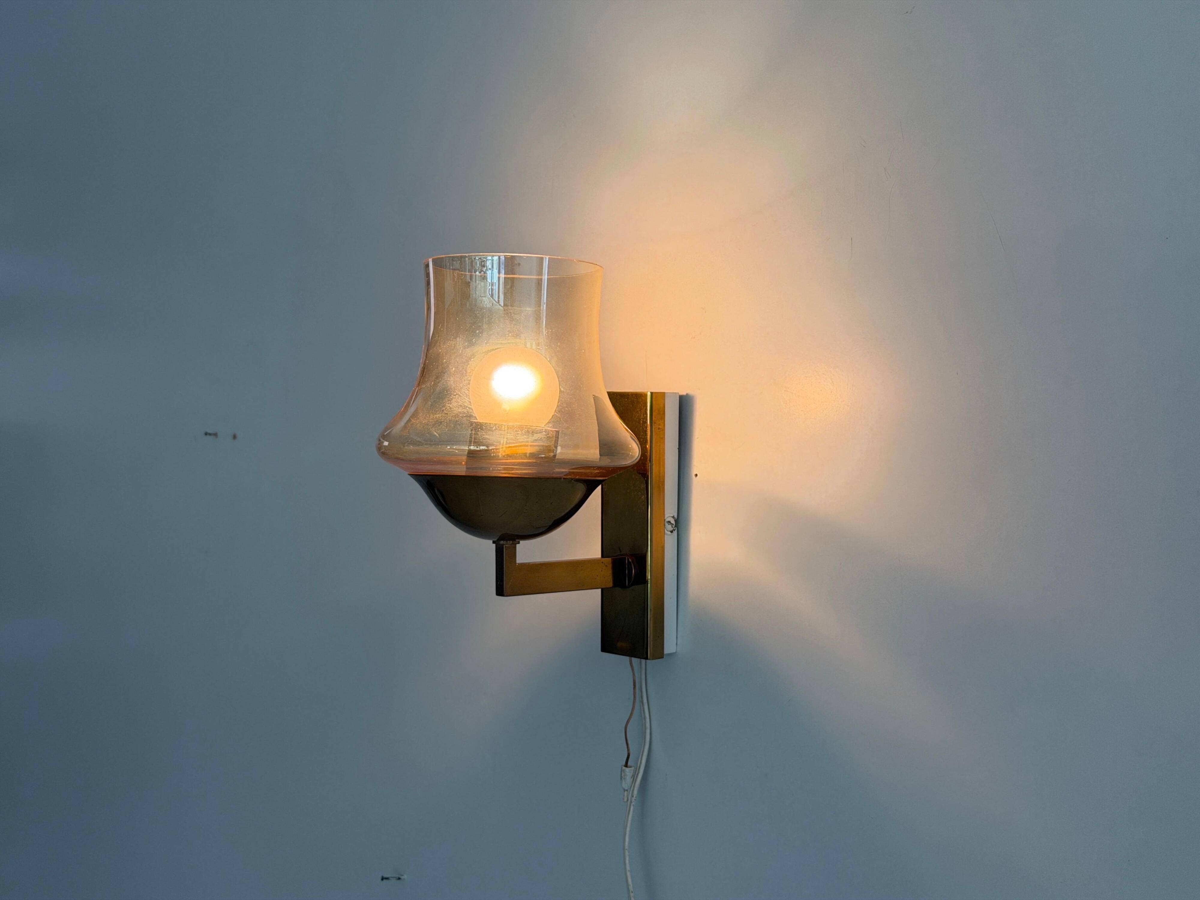 Yellow glass and brass wall light from the mid-century, 1960, Germany.