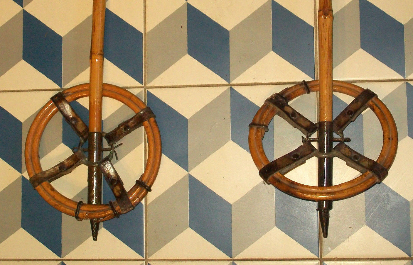 Old pair of ski reed leather stick