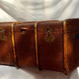 Old-time wooden travel trunk in brown