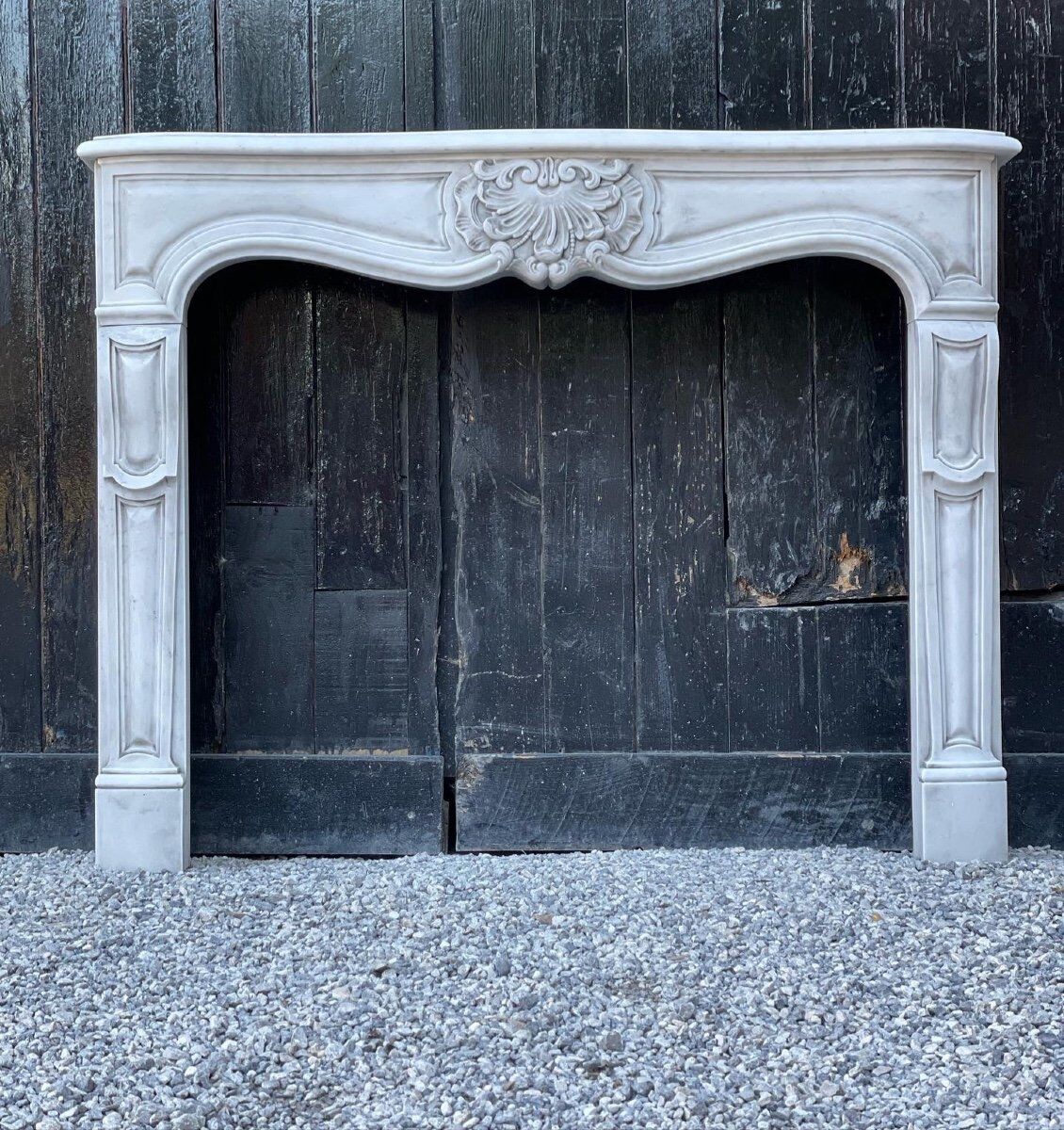 Louis XV style fireplace in Carrara marble around 1880