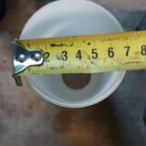 White and gold ceramic wall light