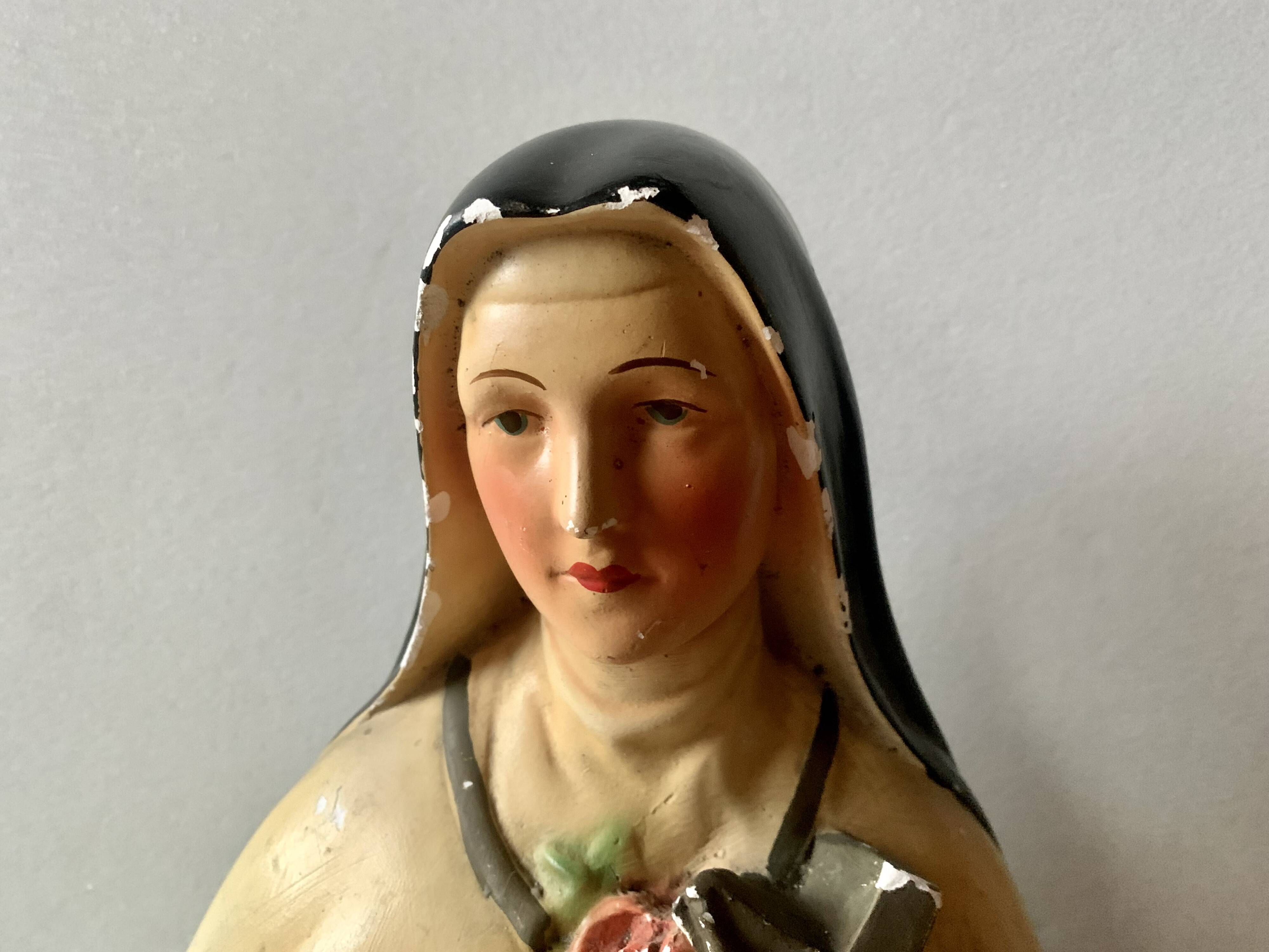 Old plaster bust of Saint Thérèse of Lisieux