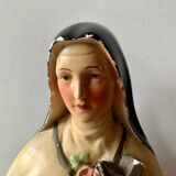 Old plaster bust of Saint Thérèse of Lisieux