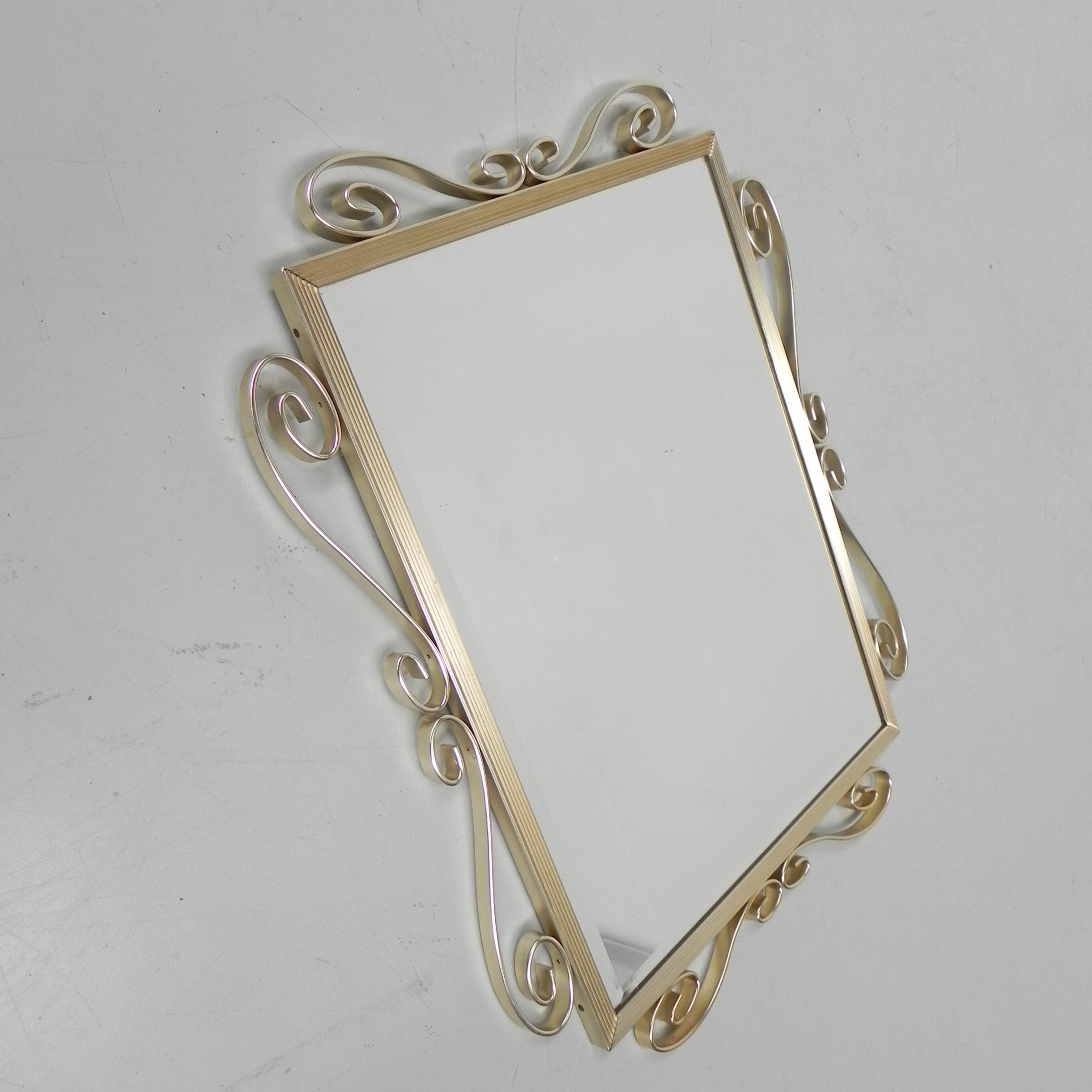 Vintage faceted mirror in aluminum frame