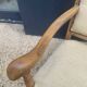 Pair of wooden and cream fabric armchairs