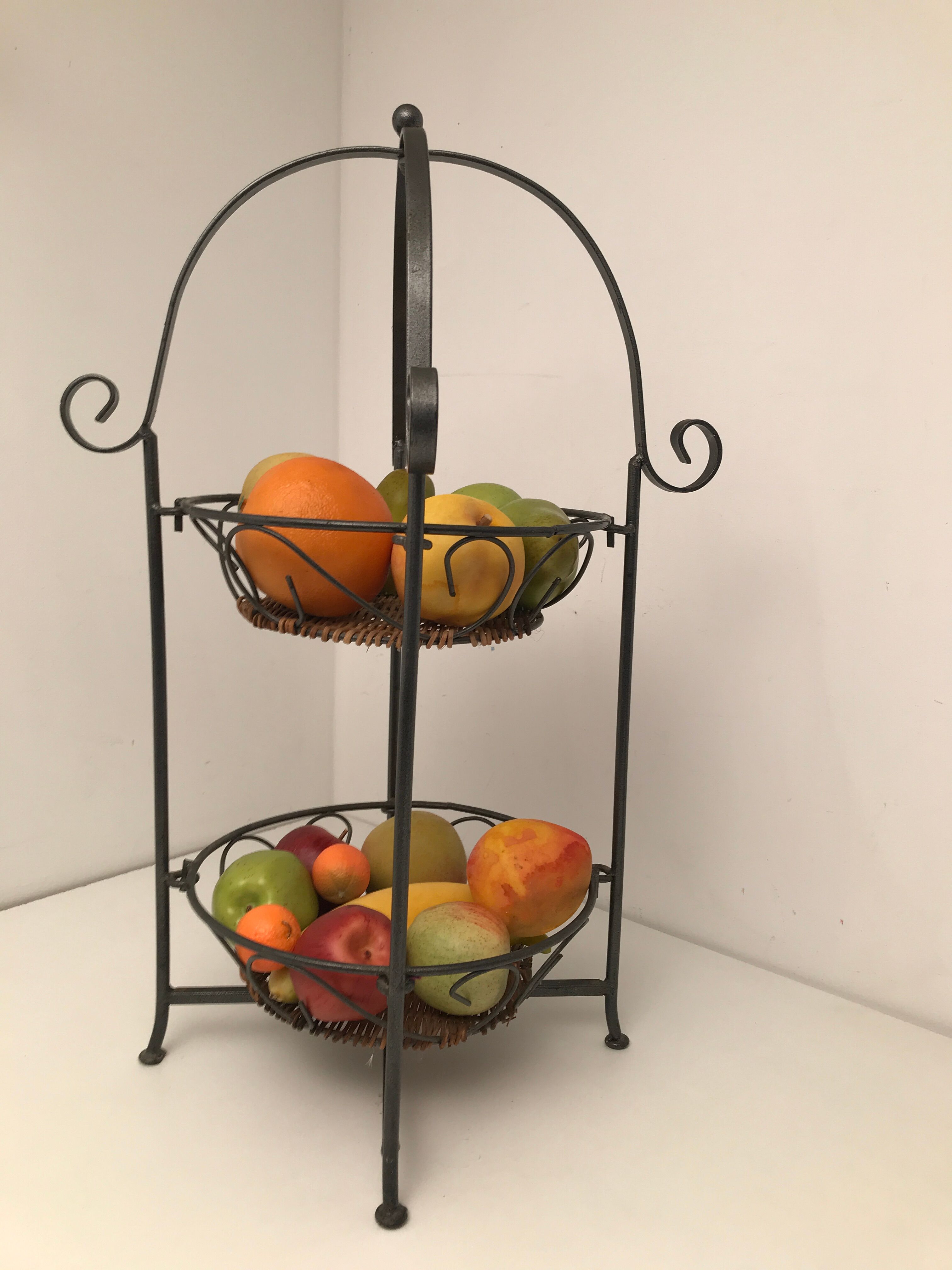 Vintage wrought iron and rattan fruit basket
