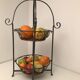 Vintage wrought iron and rattan fruit basket
