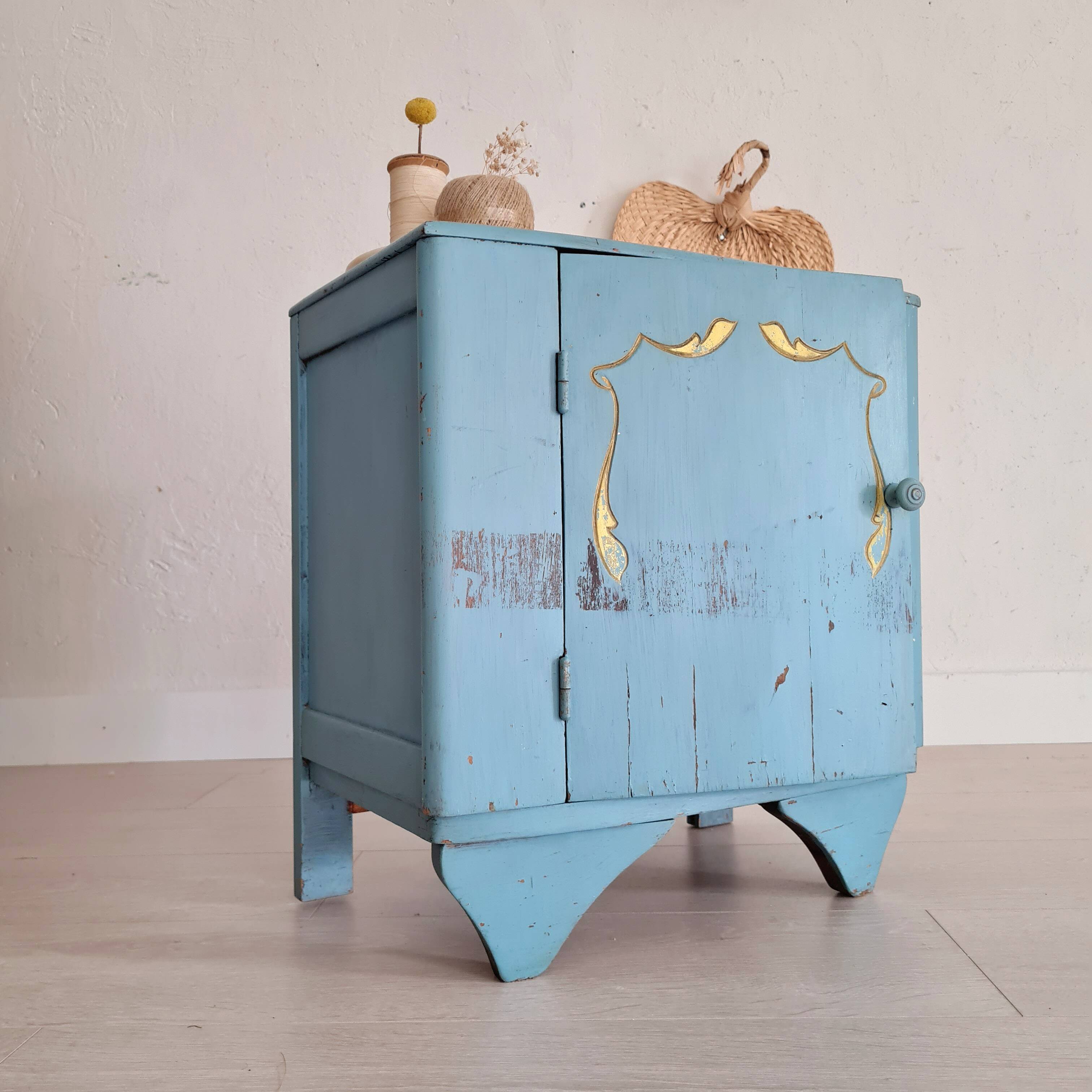Old blue wood bedside table