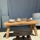 Coffee table in blond teak quadripod