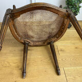 Old armchair with double cannage in walnut carved style Louis XVI of the nineteenth century