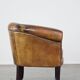 Sturdy, stately and subtle vintage sheepskin club chair