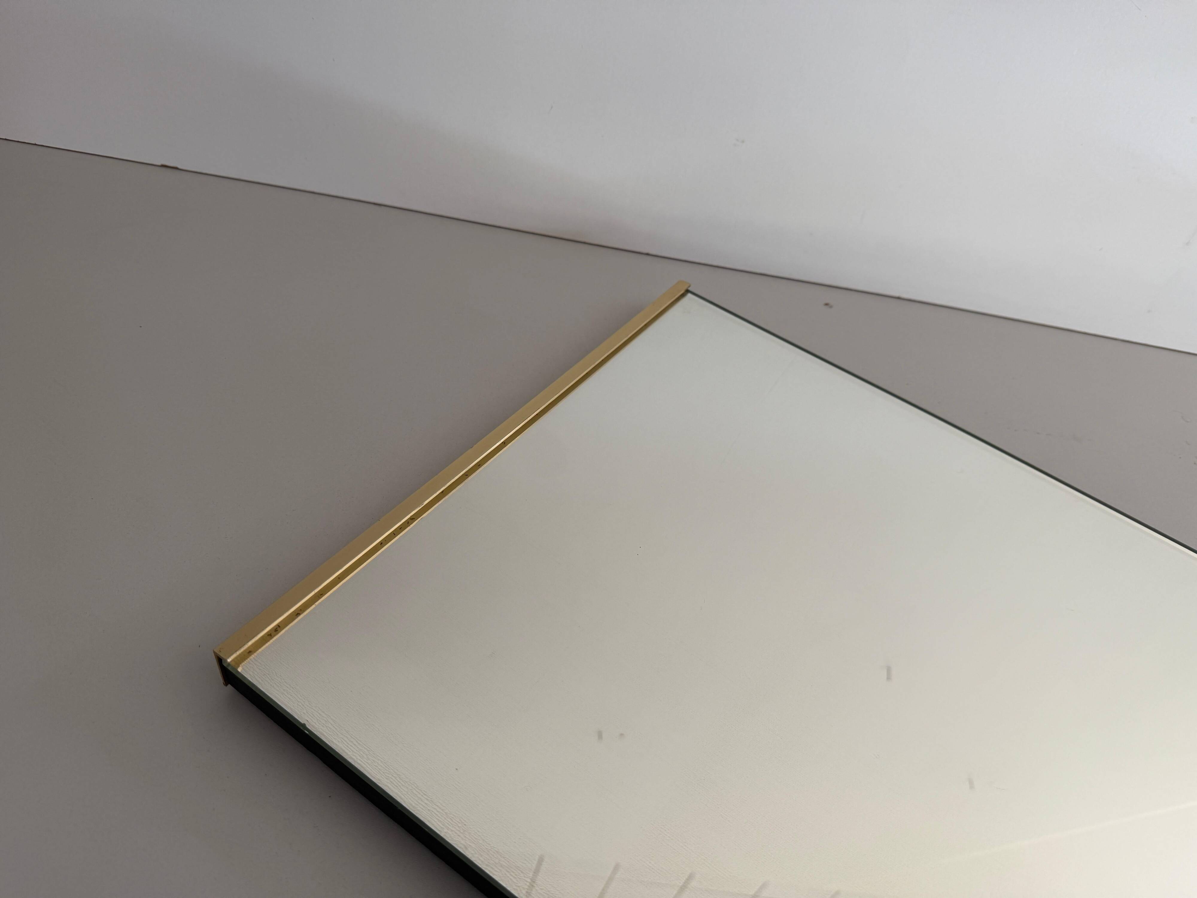 Minimalist rectangular wall mirror with a brass frame, 1960s, Germany