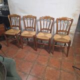 4 rustic farmhouse chairs made of wood and straw