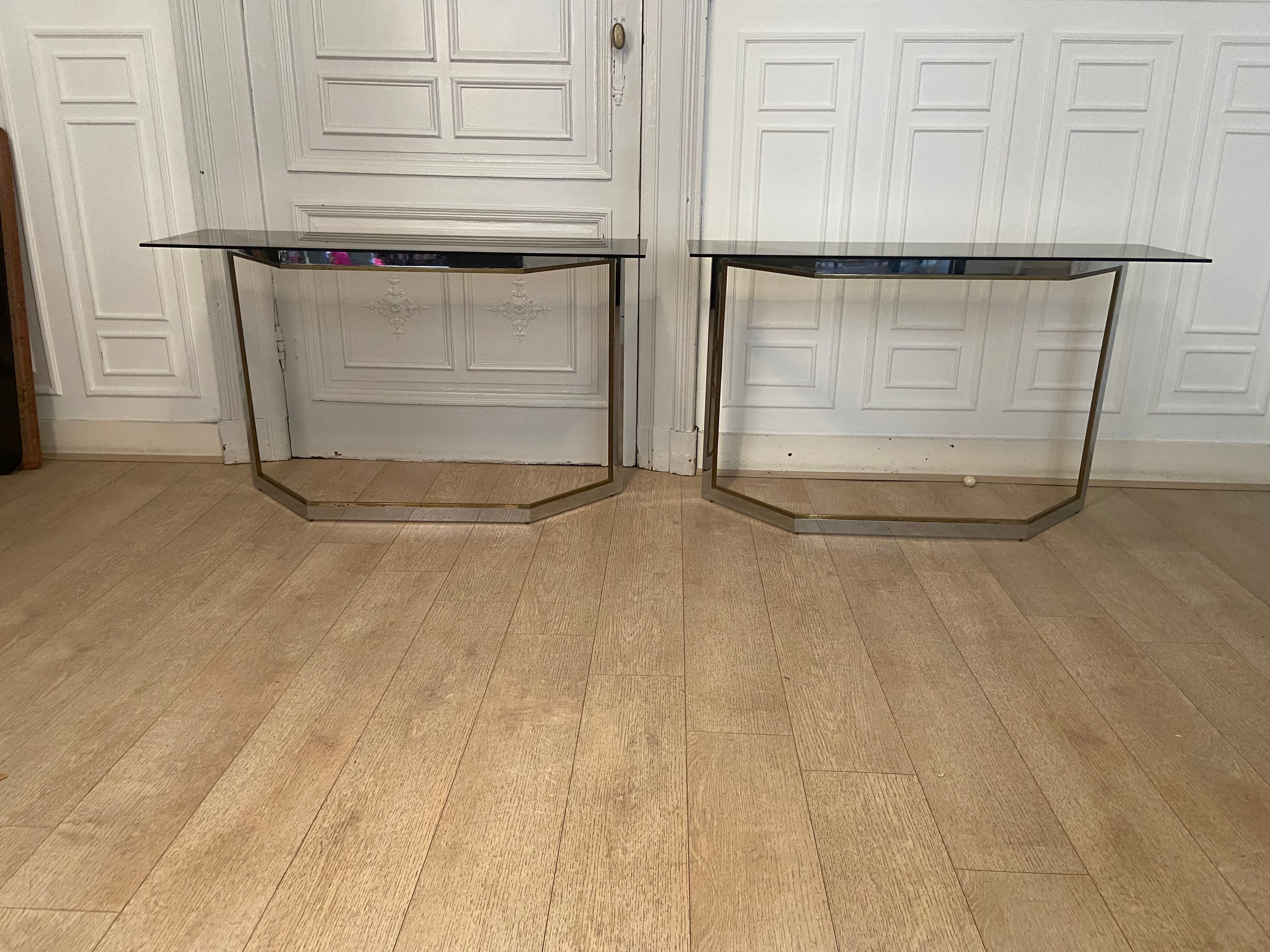 Pair of chrome metal consoles and smoked glass, Italy, 1970s