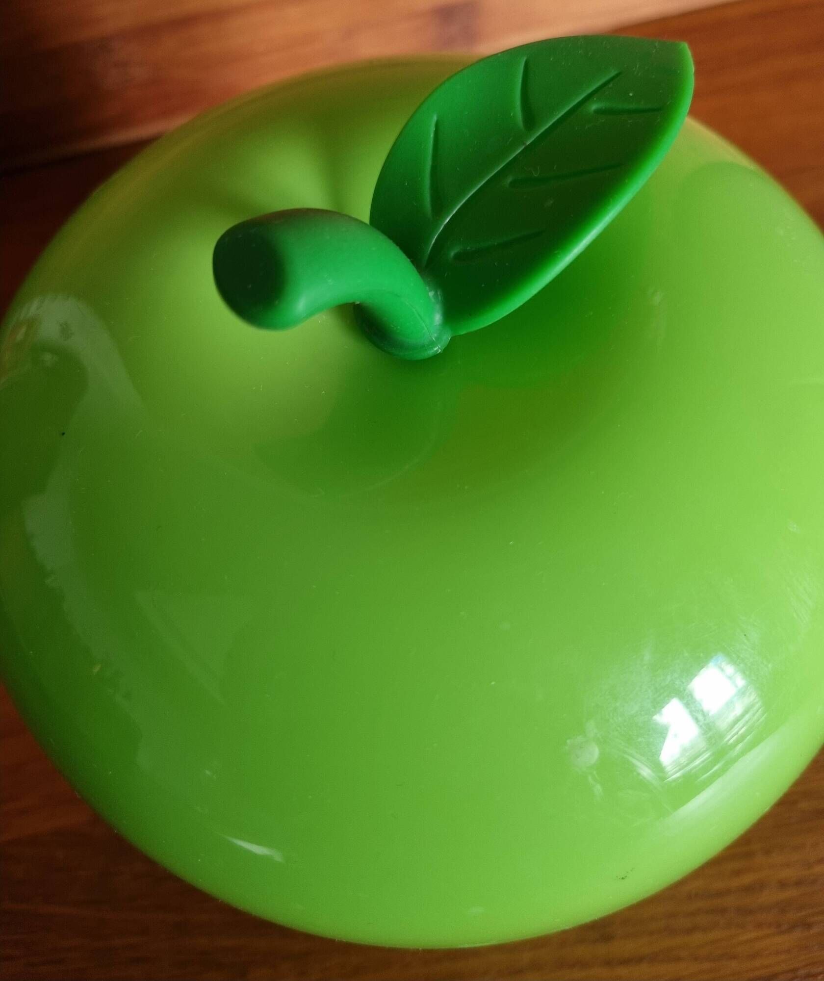 Thermal ice bucket in the shape of a green apple, 1970s style.