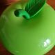 Thermal ice bucket in the shape of a green apple, 1970s style.