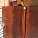 Flamed mahogany enfilade with sea green marble in Empire style.