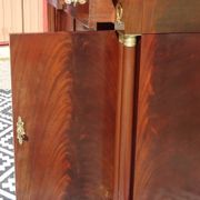 Flamed mahogany enfilade with sea green marble in Empire style.
