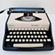 typewriter Remington Sperry rand Envoy III blue and white 70s