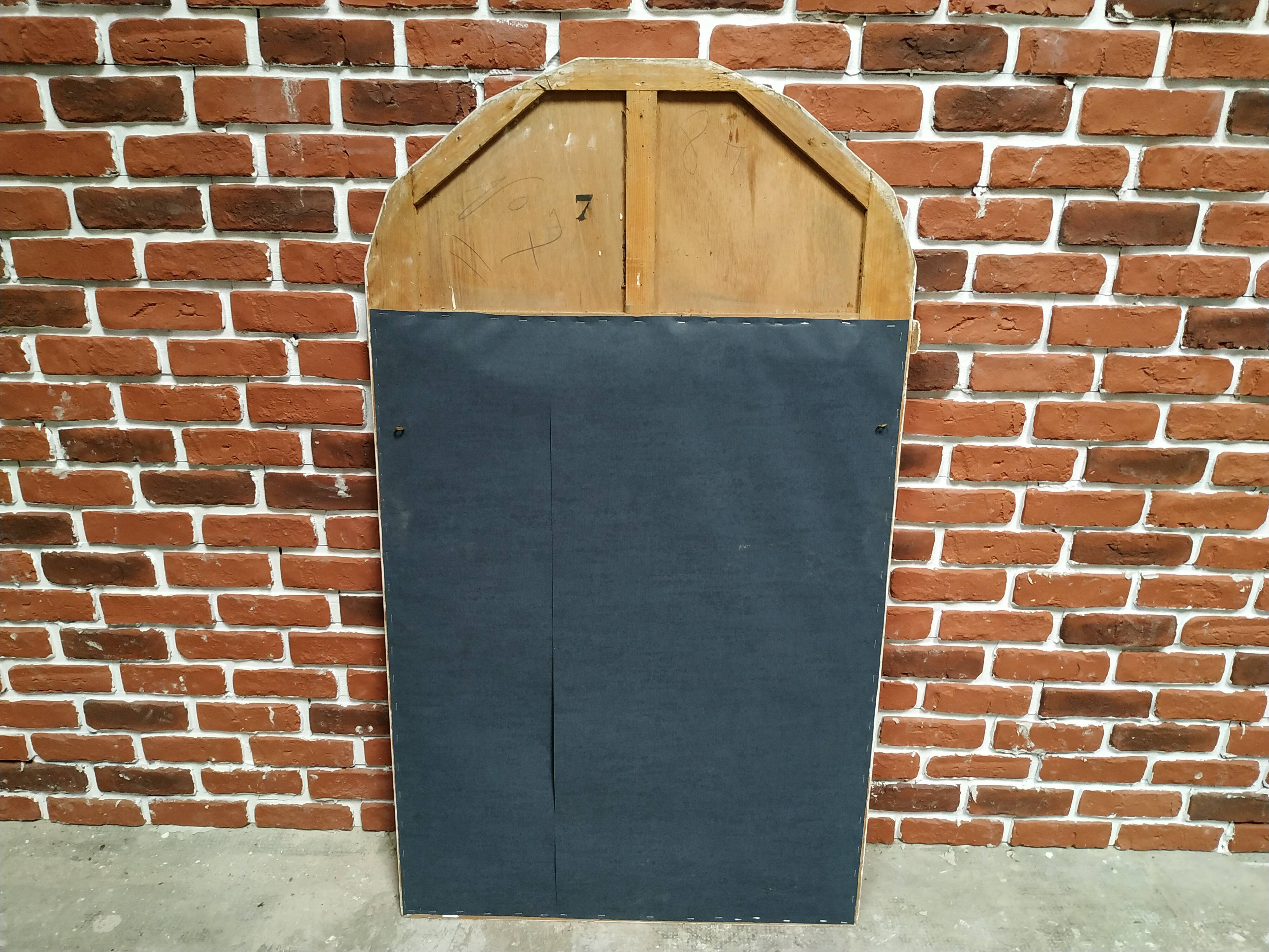 White and gold patinated sculpted mirror