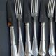 12 Forks and 12 cheese or dessert knives – Orfèvrerie Perrin Paris