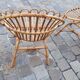 Pairs of shell rattan armchairs from the 50