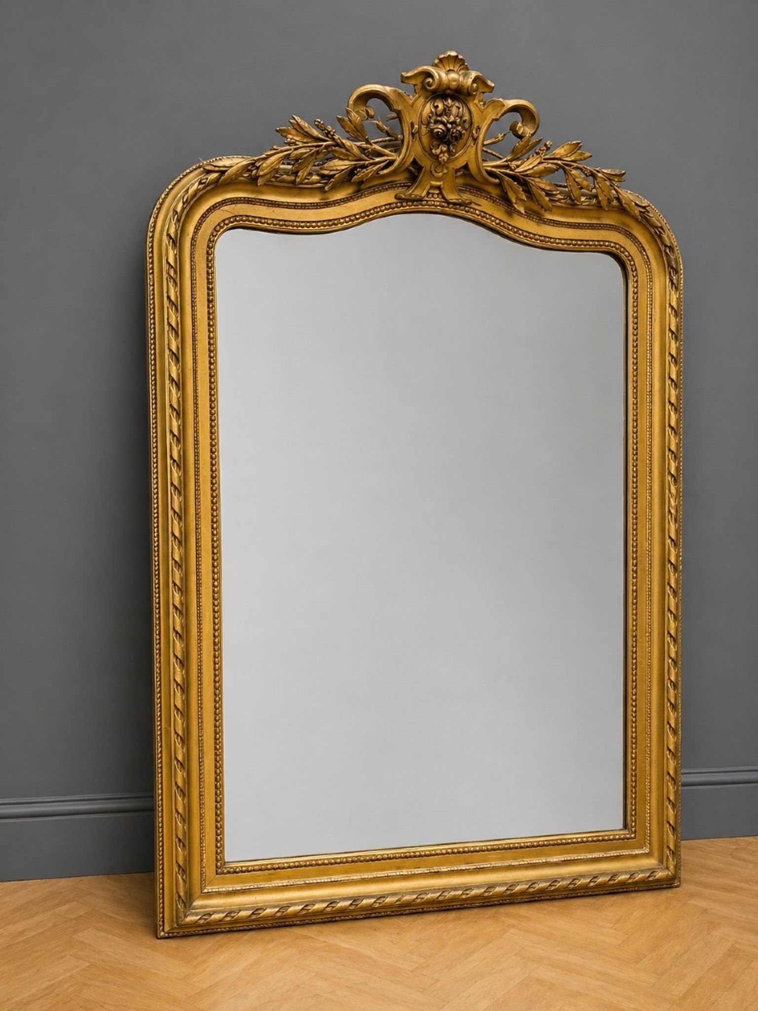 Large carved and gilded wooden mirror in Louis XV style