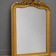 Large carved and gilded wooden mirror in Louis XV style