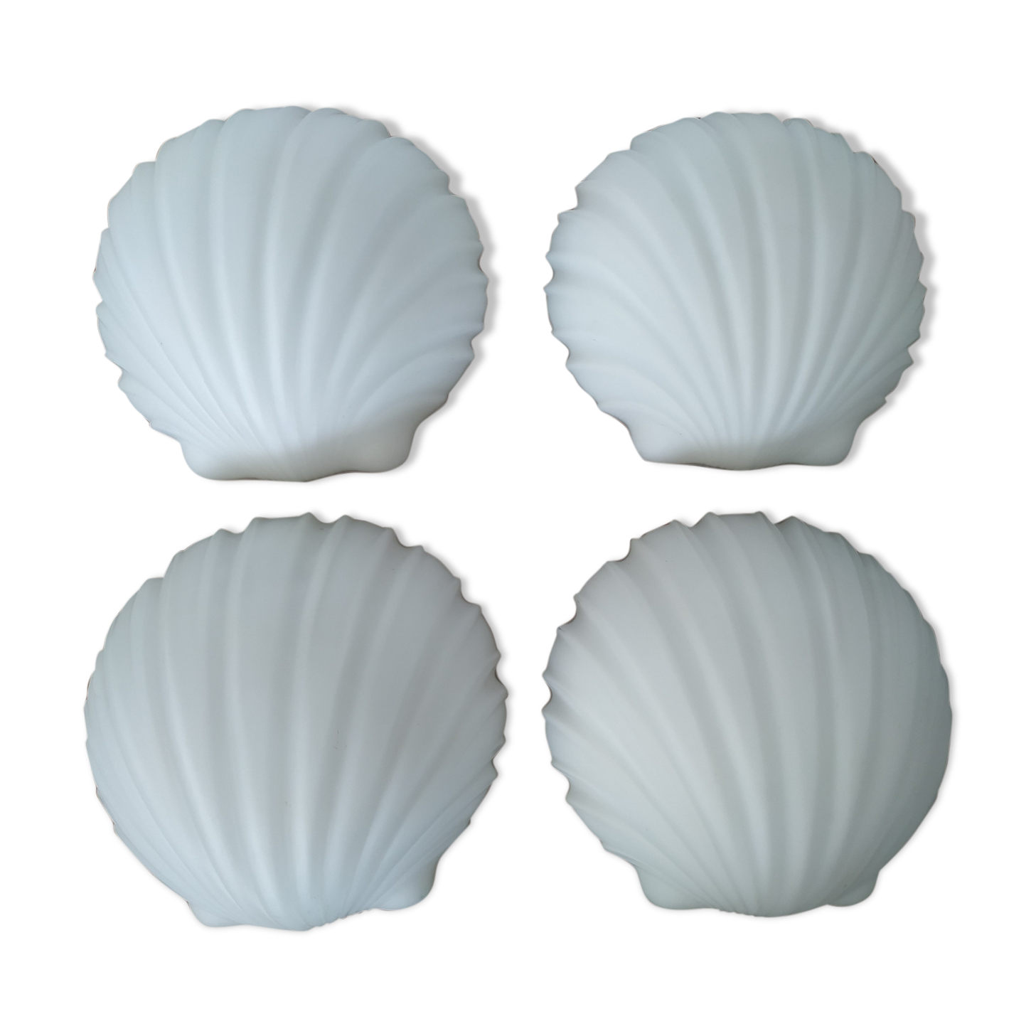 Suite of four Limburg shell sconces