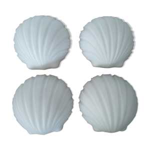Suite de quatre appliques coquillage