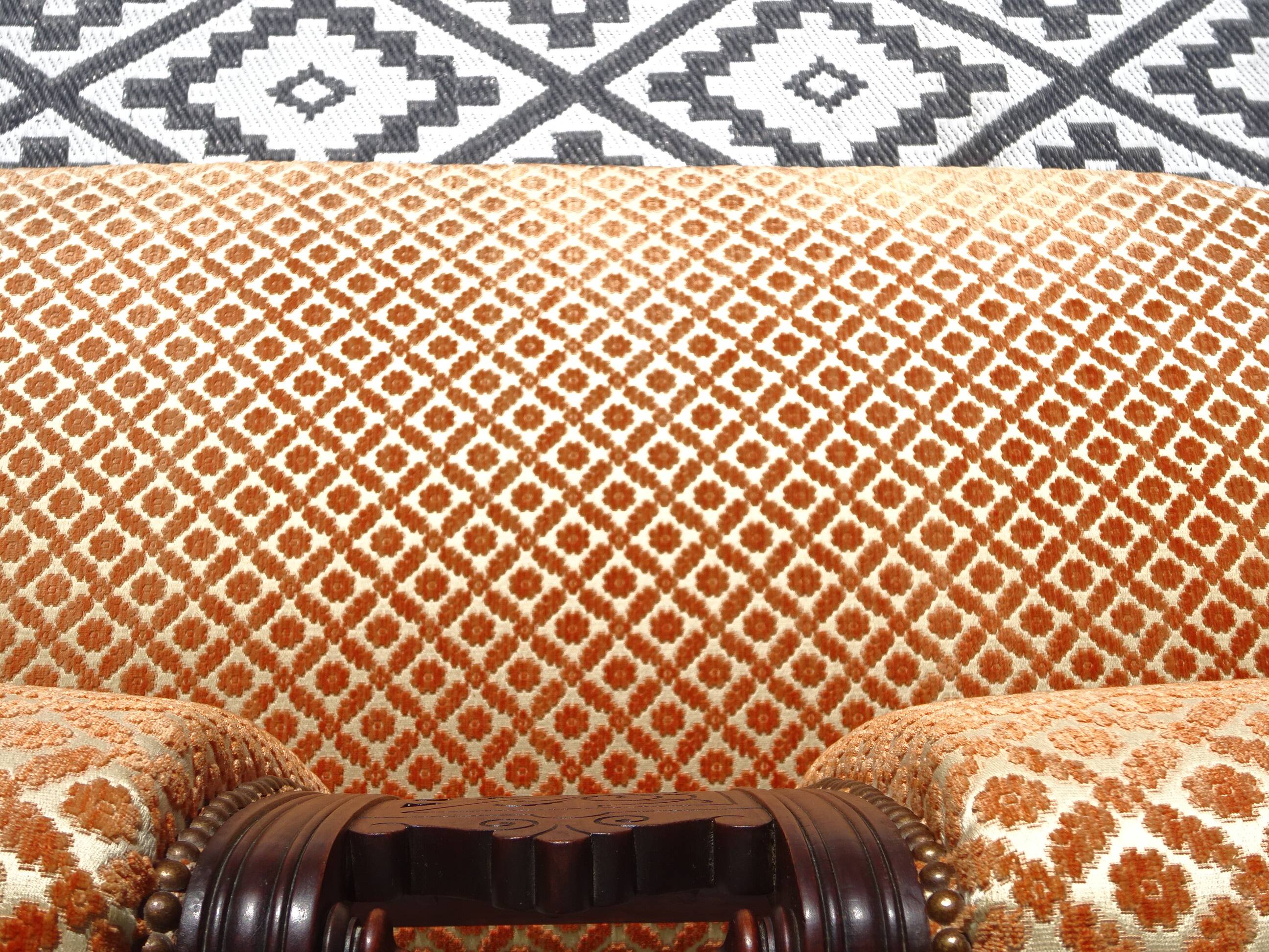 Vintage bench in wood and orange/ivory velvet.