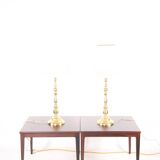 Pair of large brass lamps
