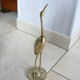 Heron in vintage brass