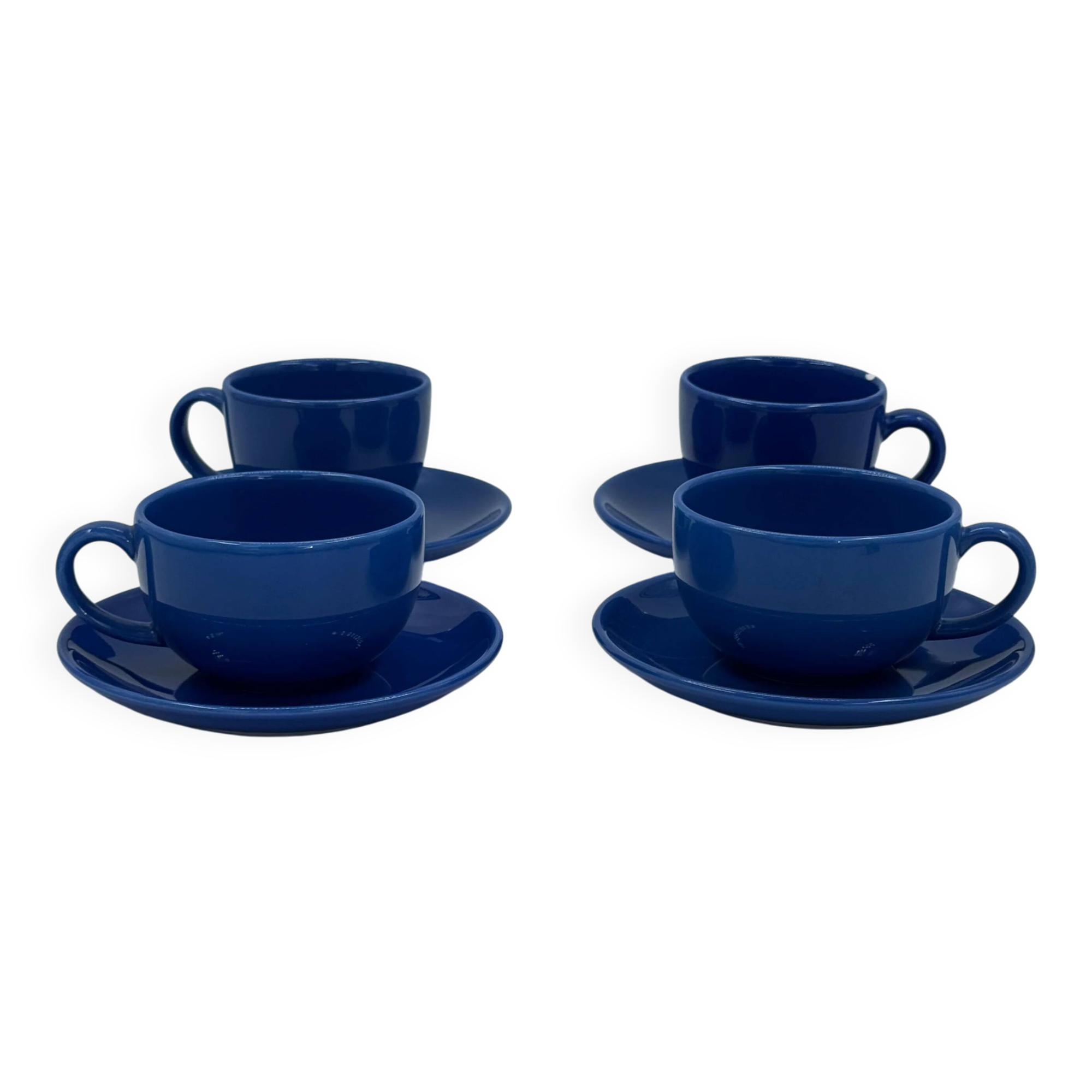 Set of 4 vintage blue ceramic cups and saucers.