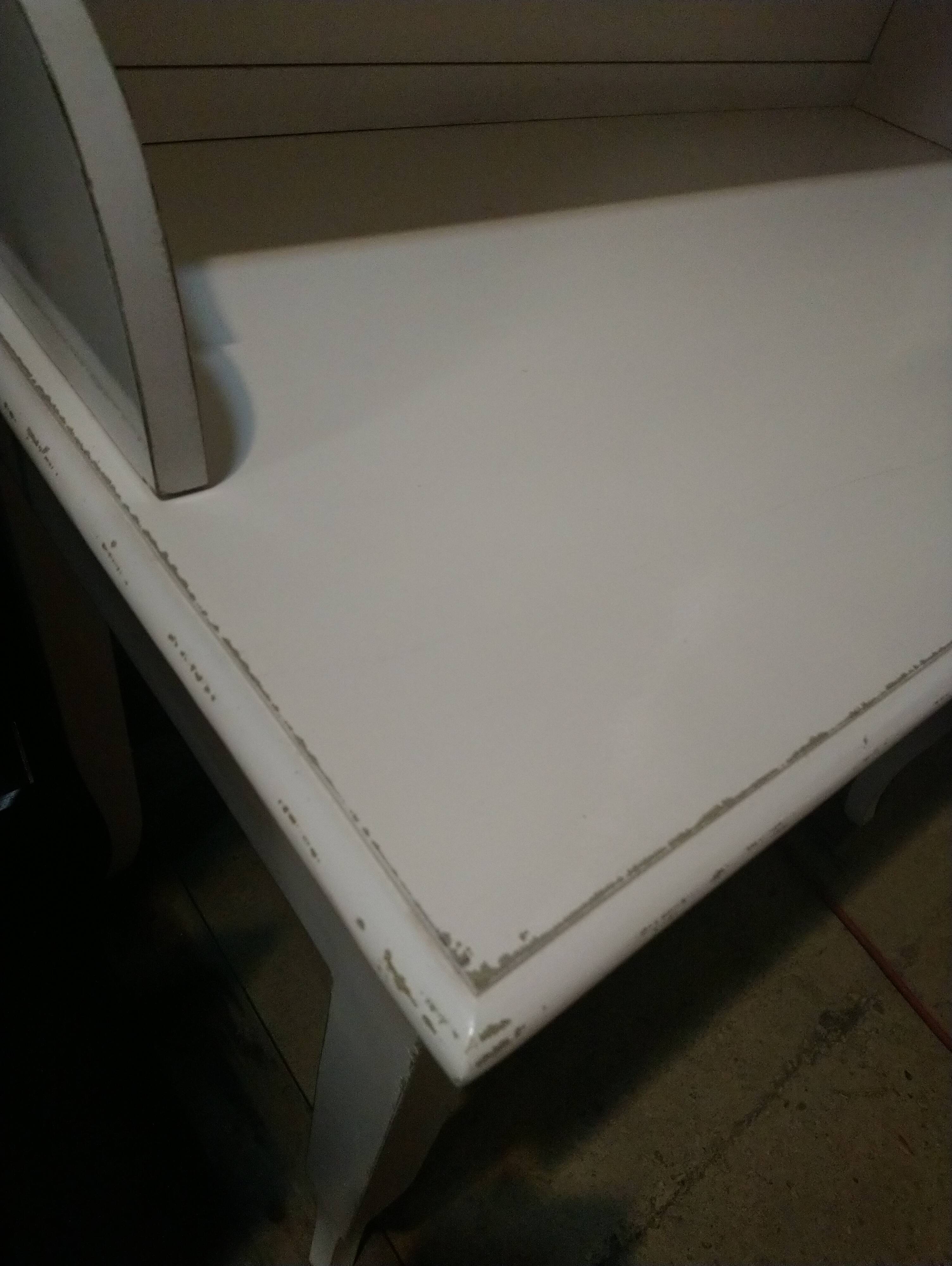 White lacquered desk.