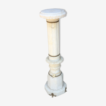 Light-lit white marble column