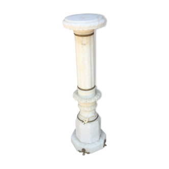 Light-lit white marble column
