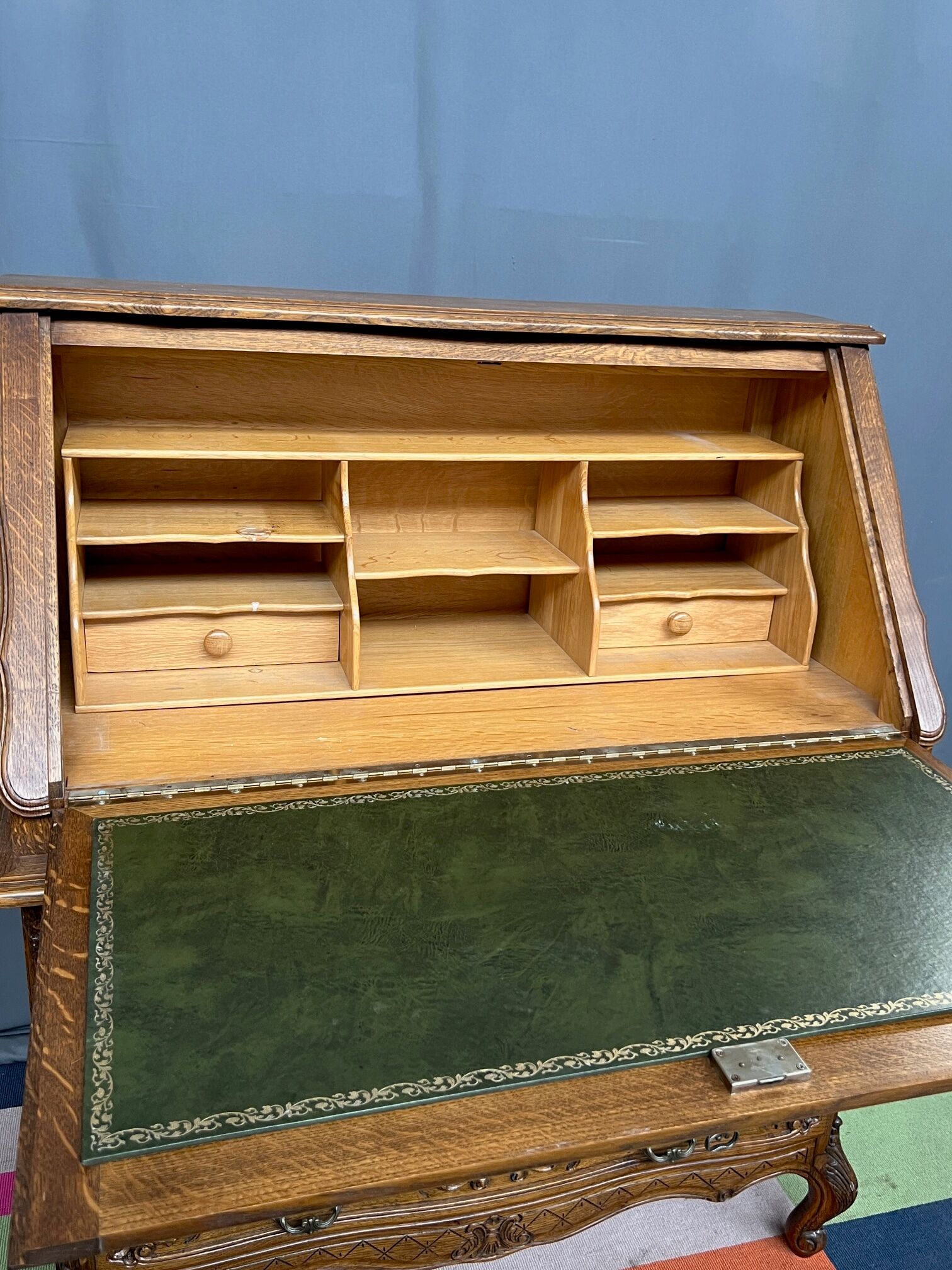 Liège secretary in carved oak in Regency style.