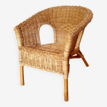 Vintage children's armchair in wicker and rattan