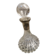 Antique cut glass spirit decanter with silver-plated neck and spout.
