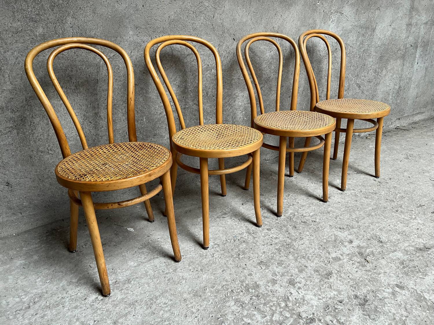 Set of 4 vintage bistro chairs in curved wood and cane seats 1950 1960
