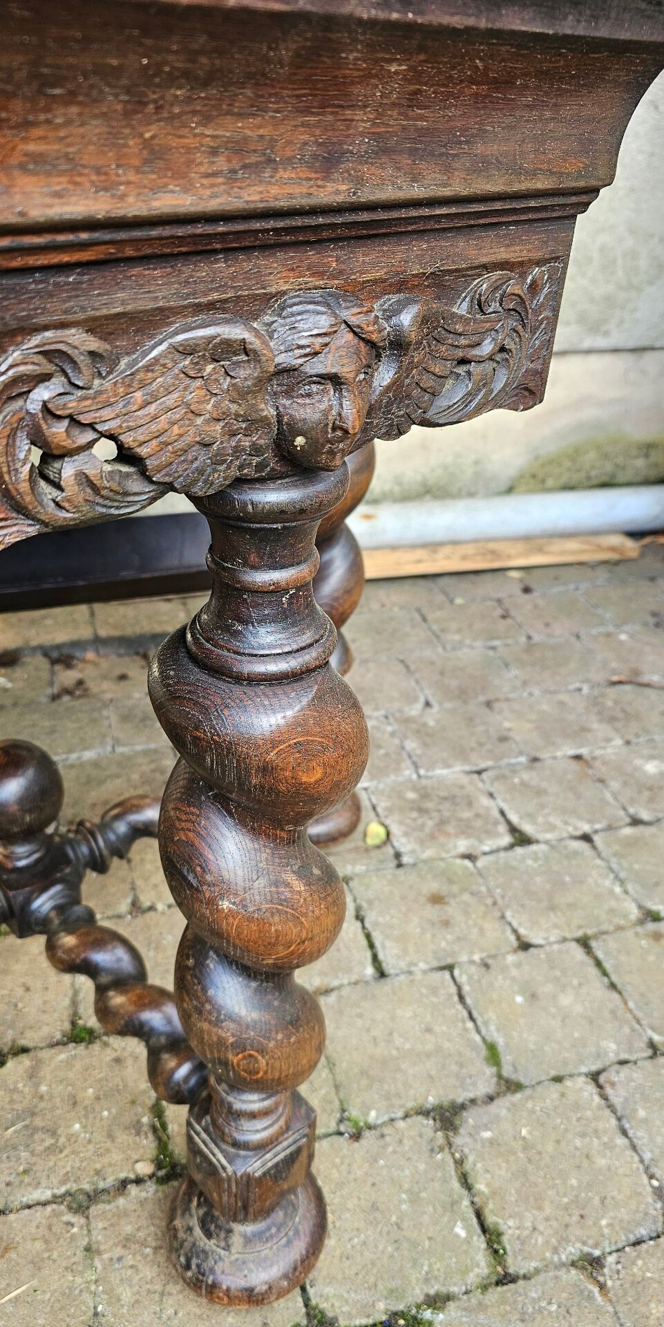 Large octagonal table in carved solid oak.