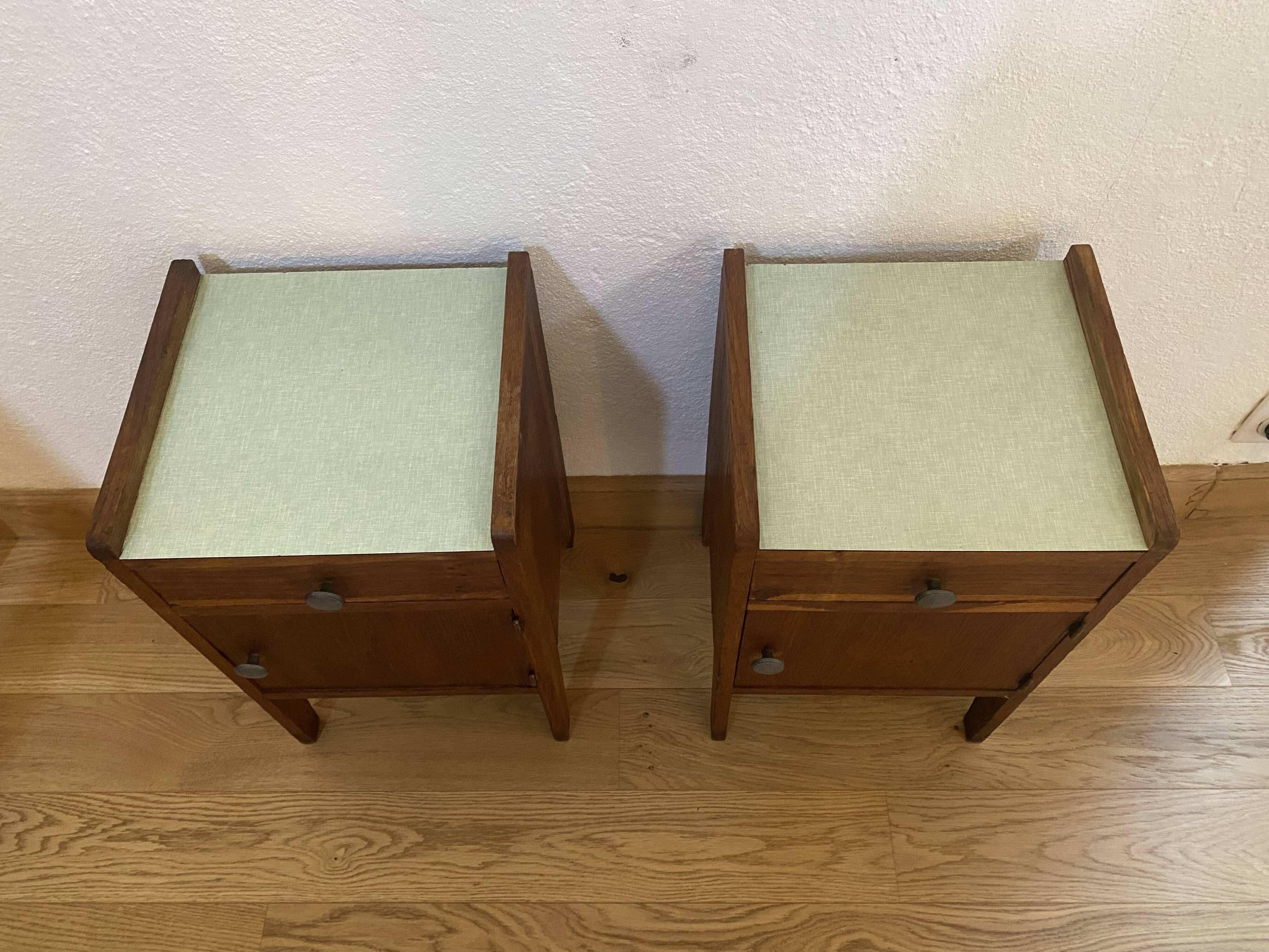 Pair of solid oak bedside tables from the 1950s.