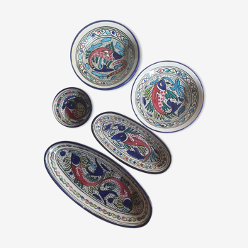 Set of ceramic ethnic dishes and plates