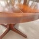 round/oval table with extension, central leg, dark shade, Baumann design