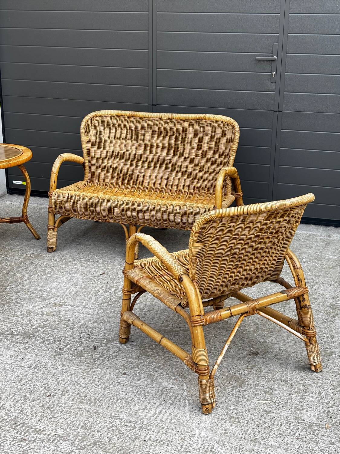 Vintage rattan garden furniture – complete set with sofa and armchairs.