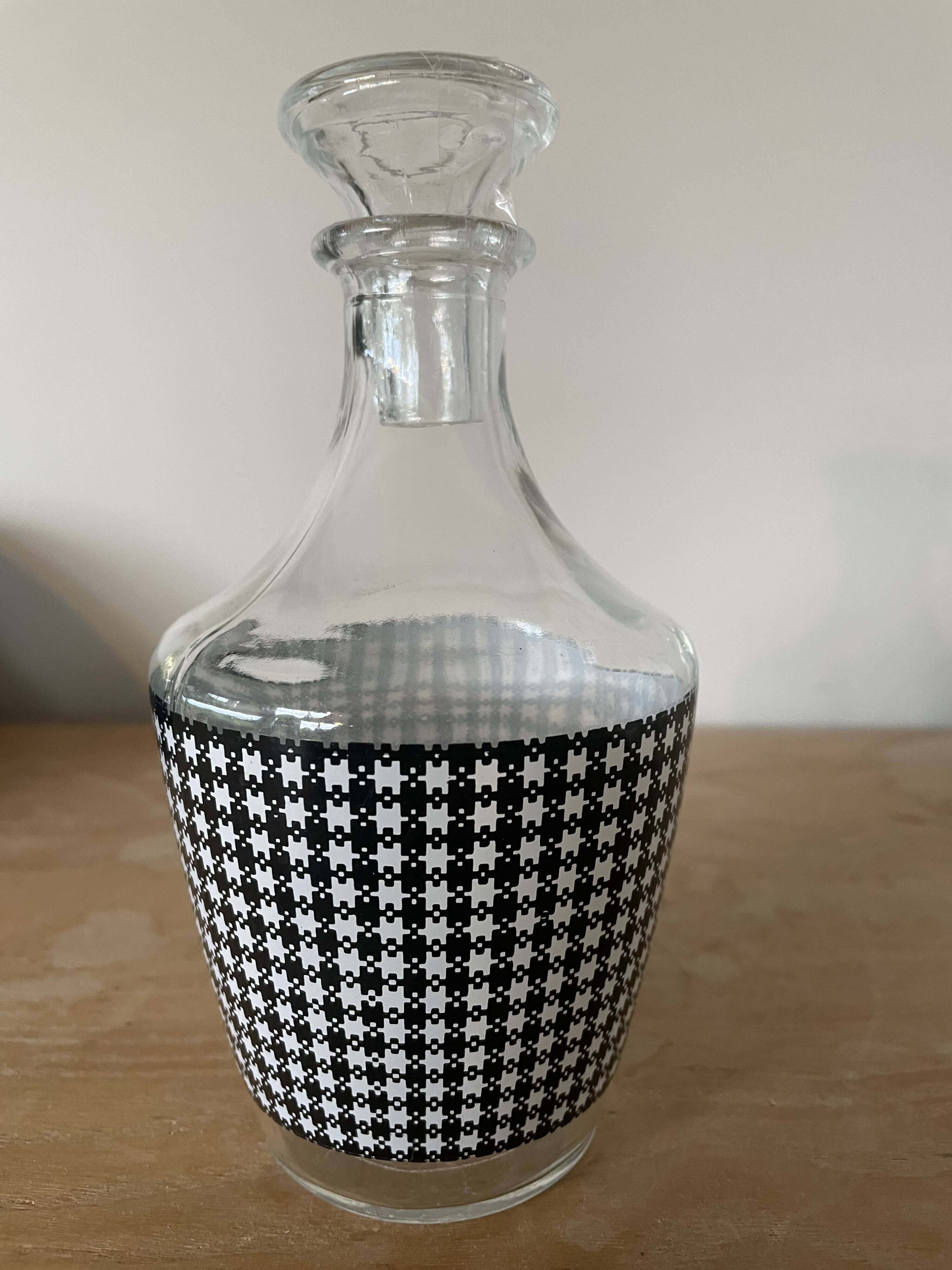 Small black and white checkered carafe with original glass stopper
